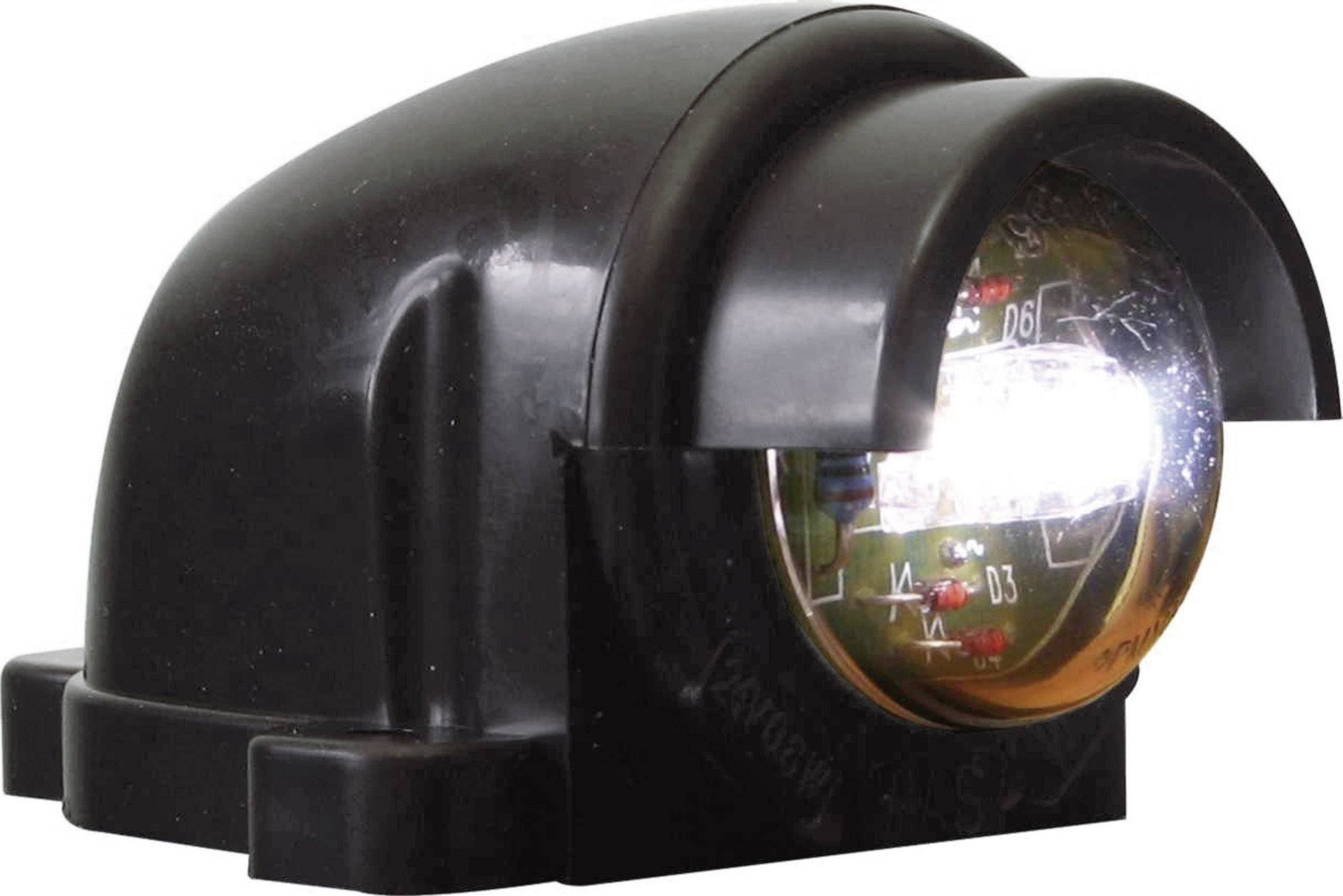 Black device with a translucent, illuminated front area, potentially an electronic or mechanical sensor or display unit.