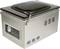 Stainless steel vacuum sealer with transparent lid and control panel on the front; used for sealing food.