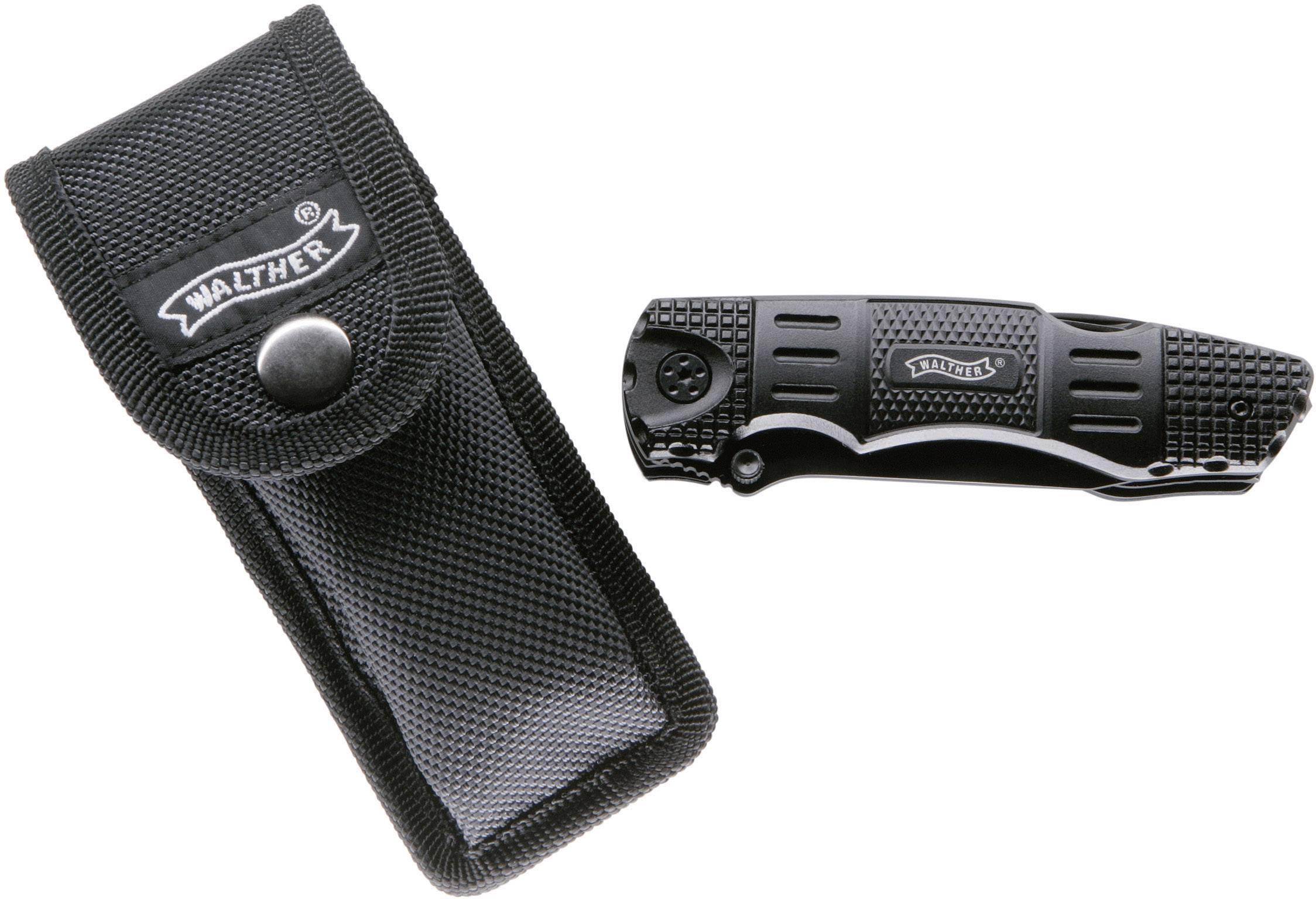 A black folding pocket knife beside a matching black pouch, placed on a white background.