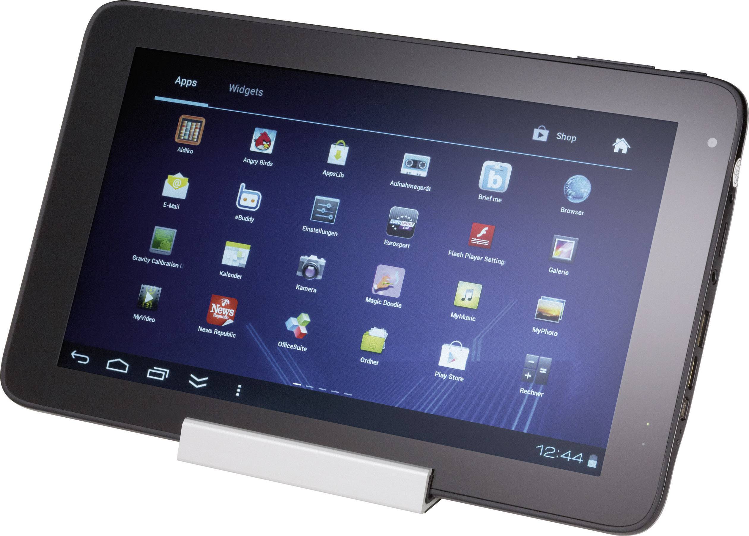 A tablet on a stand displays a home screen with multiple app icons and a time display in the bottom corner.