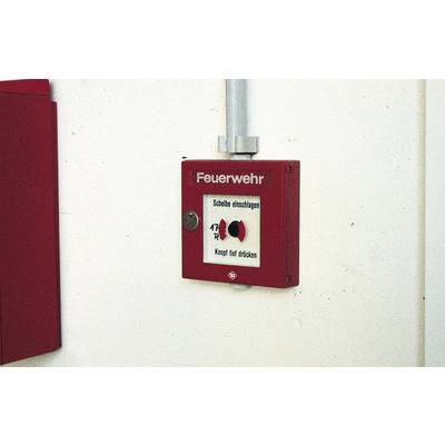 Red fire alarm on the wall; label reads 'Fire Brigade'. Instructions: 'Smash glass, press button firmly'.