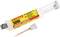 A syringe with 'LOCTITE 3090 Adhesive', yellow-red inscription, removable mixing nozzle, for precise bonding applications.