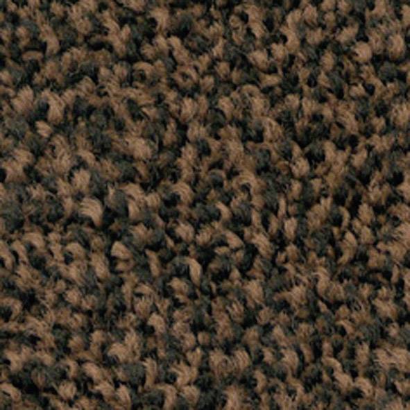 Close-up of a brown and black carpet with dense, textured fibres.