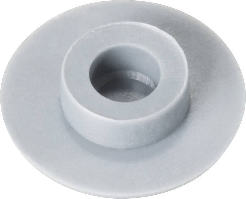 Grey plastic density insert in cylindrical form, serves as a seal or spacer, diameter larger than height.