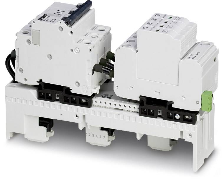 Two white electrical circuit breakers mounted on a DIN rail, with connections and green terminal, for energy distribution.