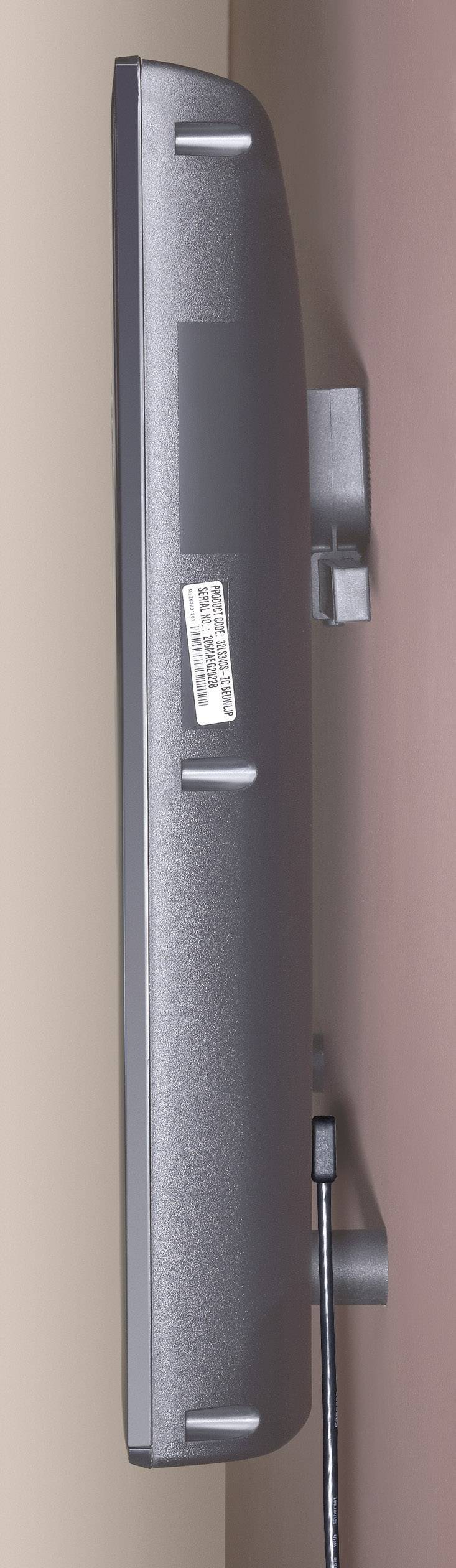 Side view of a wall-mounted flat-screen monitor with visible cable, suitable for space-saving home office setup.