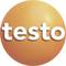 The image shows an orange logo with the white text 'testo'.