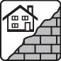 Image of a house next to a wall.