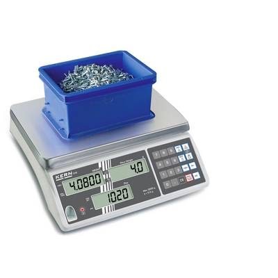 Une balance numérique affiche un récipient bleu contenant des vis. L'écran indique un poids total de 4,0800 kg, un poids unitaire de 4,0 g et 1020 pièces.