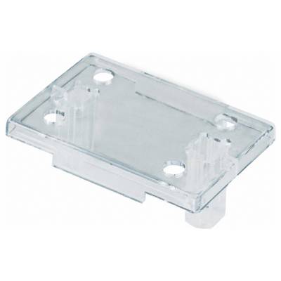 « Un couvercle rectangulaire transparent en plastique avec quatre trous aux coins et deux supports cylindriques surélevés à chaque extrémité. »