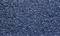 Fond bleu structurel composé de petits fragments irréguliers comprimés.