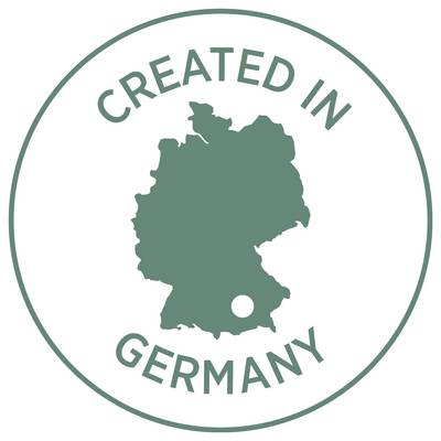Sceau vert rond avec la silhouette de l'Allemagne et le texte « CREATED IN GERMANY ».
