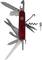 Un couteau suisse multifonction rouge avec divers outils tels que lame, scie, ciseaux, tire-bouchon et tournevis.