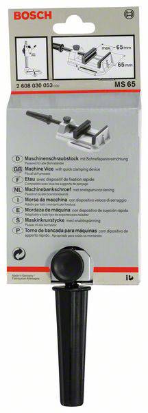 Emballage d'un étau de machine Bosch MS 65. Présente une image du produit avec description en plusieurs langues, largeur de serrage maximale de 65 mm.