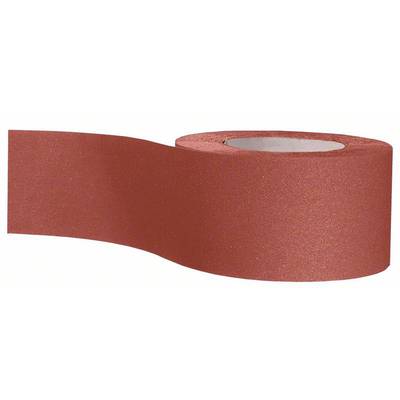 Un rouleau de papier de verre brun en gros plan, légèrement déroulé, révèle sa surface rugueuse.