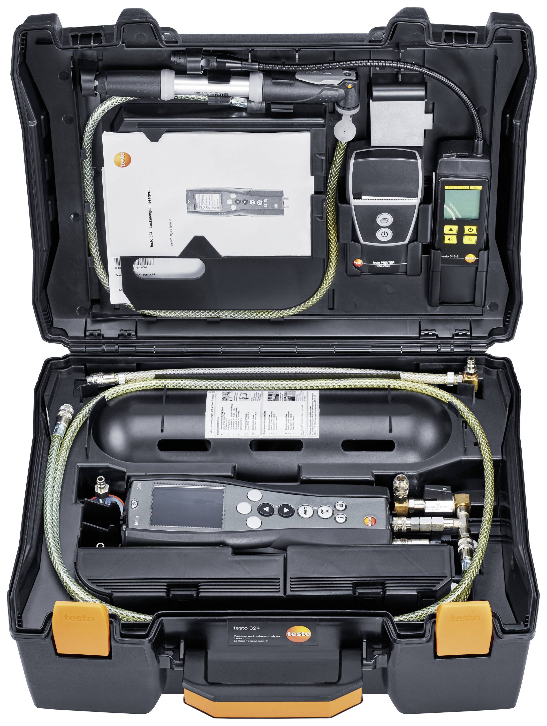 Une boîte à outils noire ouverte contenant plusieurs instruments de mesure et accessoires pour applications techniques.