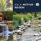 Système de filtration d'étang 'FIAP Aqua Active 30.000' pour une eau d'étang claire, cascade et ruisseau dans un jardin naturel.
