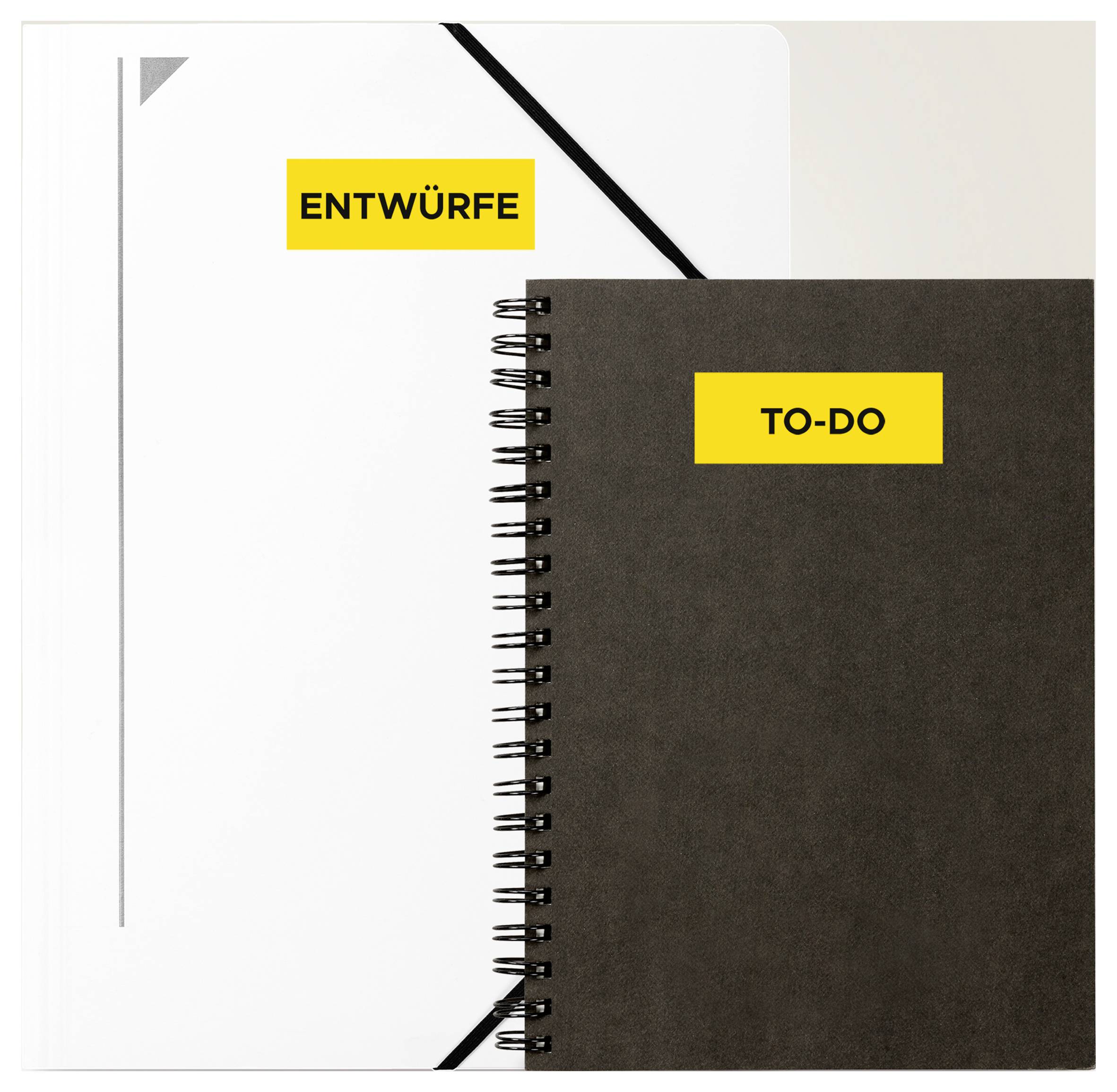 Deux carnets côte à côte : à gauche blanc avec l'étiquette « BROUILLONS », à droite foncé avec l'étiquette « À FAIRE ».