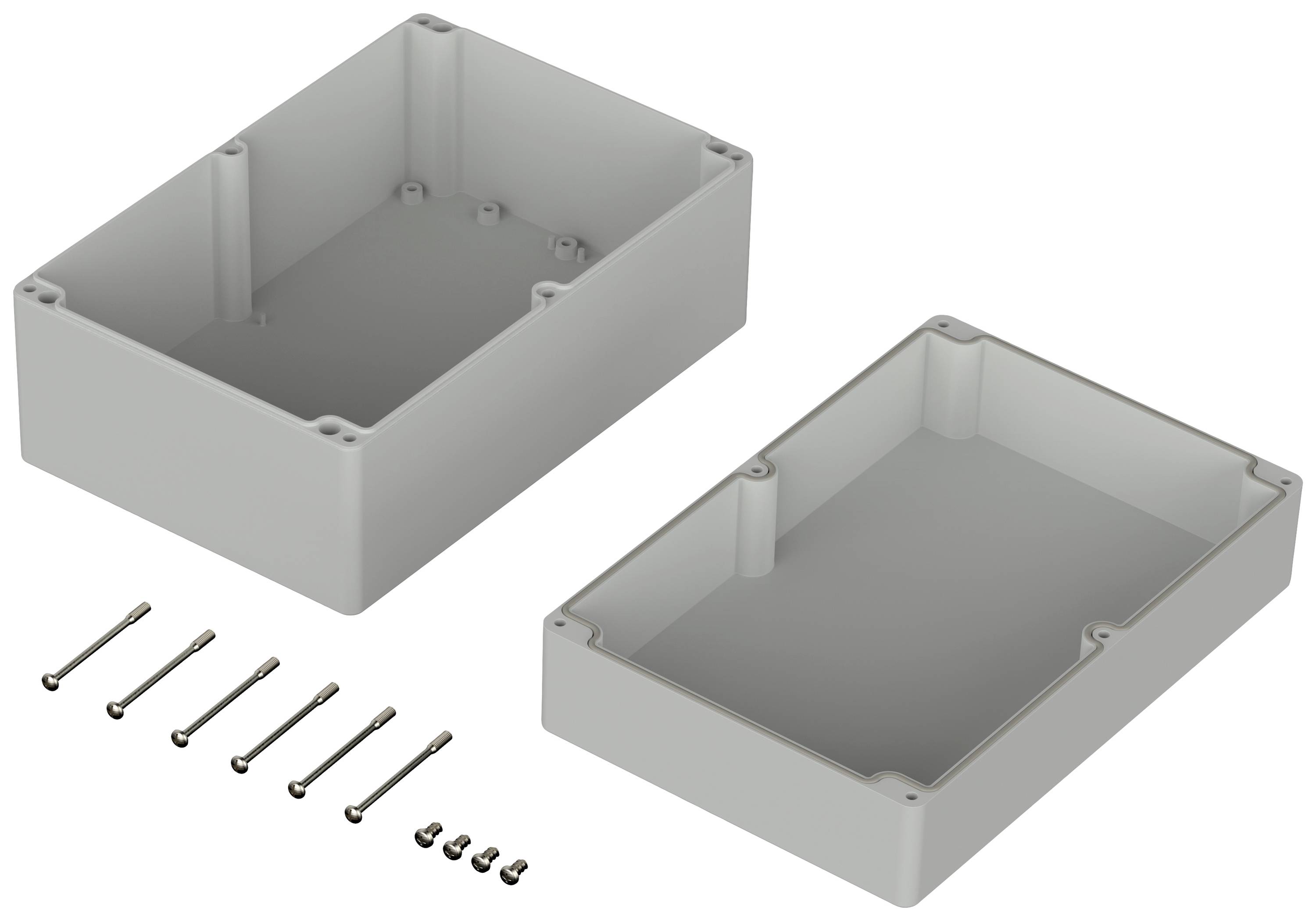 Pièces de boîtier en plastique, représentées en éclaté. À gauche la partie supérieure du boîtier, à droite la partie inférieure, en dessous les vis de fixation.