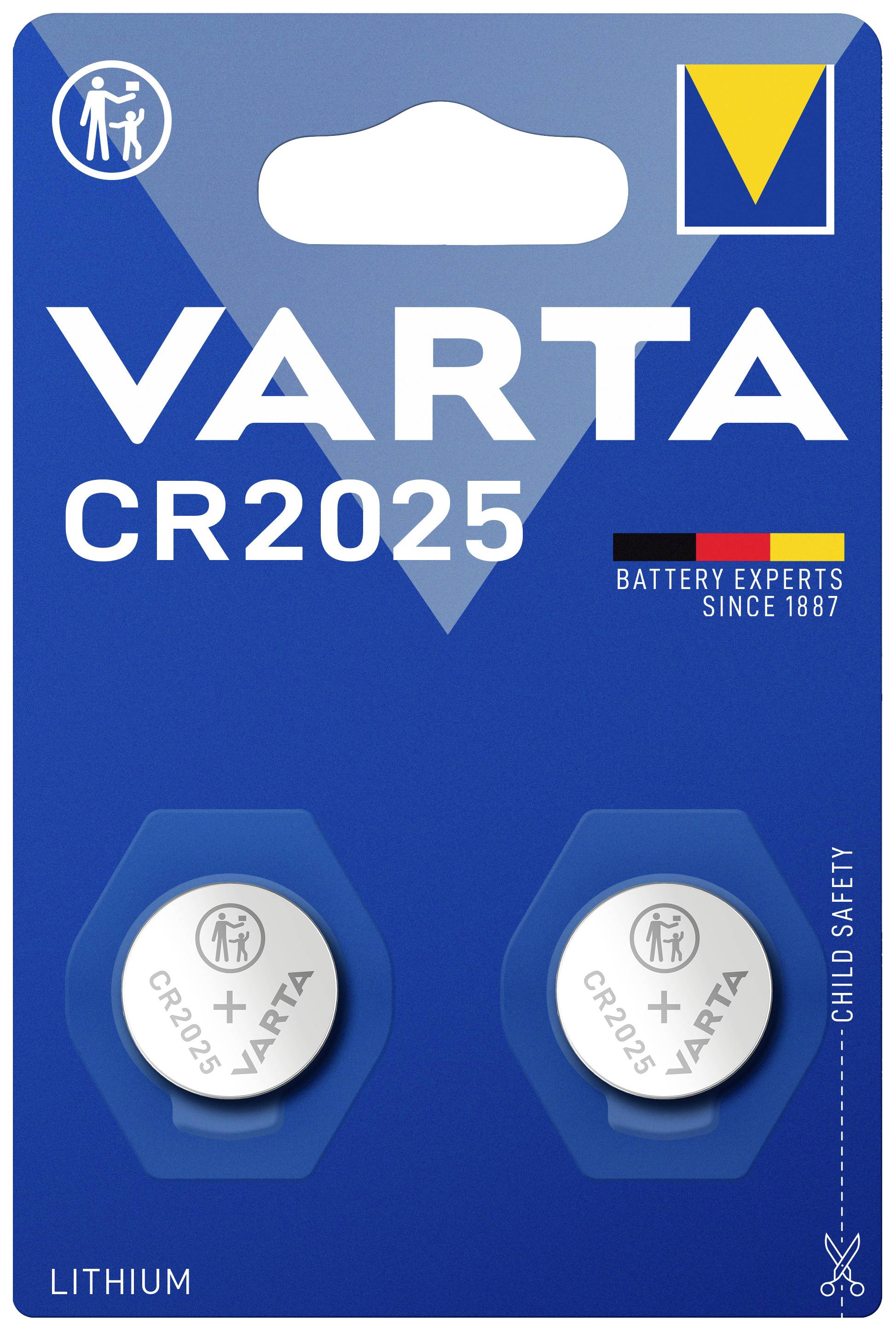 Deux piles bouton VARTA CR2025, emballées dans un carton bleu. Texte : « Experts en piles depuis 1887 », « Sécurité enfants ».
