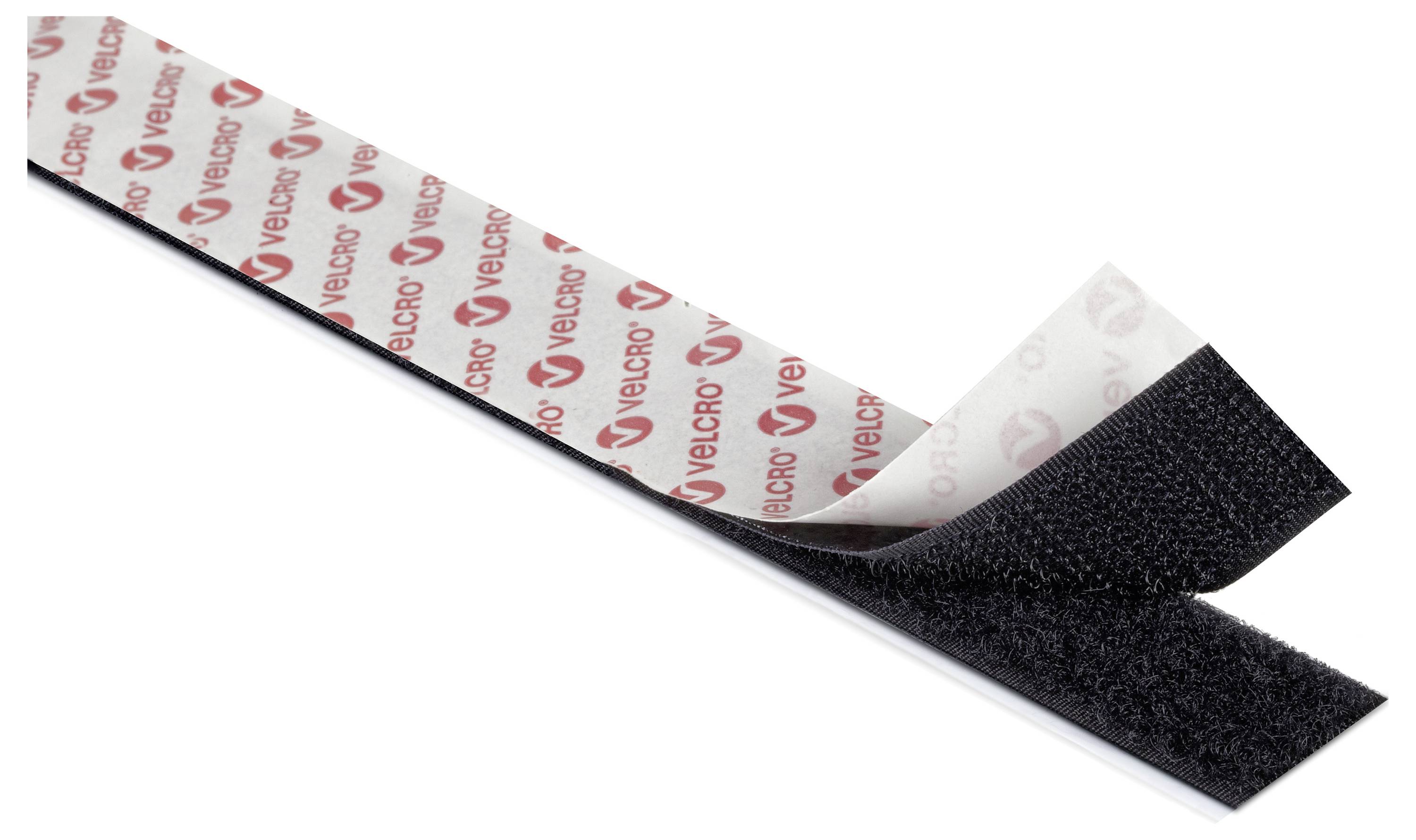 Une bande de ruban adhésif Velcro avec des côtés crochet et boucle partiellement séparés, montrant la surface texturée du crochet et le dos marqué.