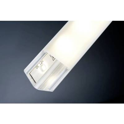 Une lampe LED lumineuse pointée contre un arrière-plan sombre. Elle est allongée et produit une lumière blanche et vive.