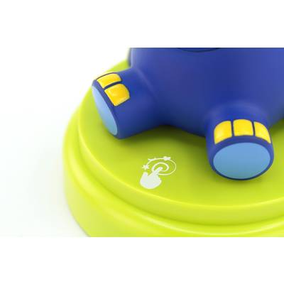 Un jouet bleu et jaune sur une base verte avec un symbole tactile qui semble indiquer une fonction interactive.
