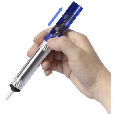 Une main tient un fer à dessouder. Une flèche bleue indique la direction du mécanisme du fer.