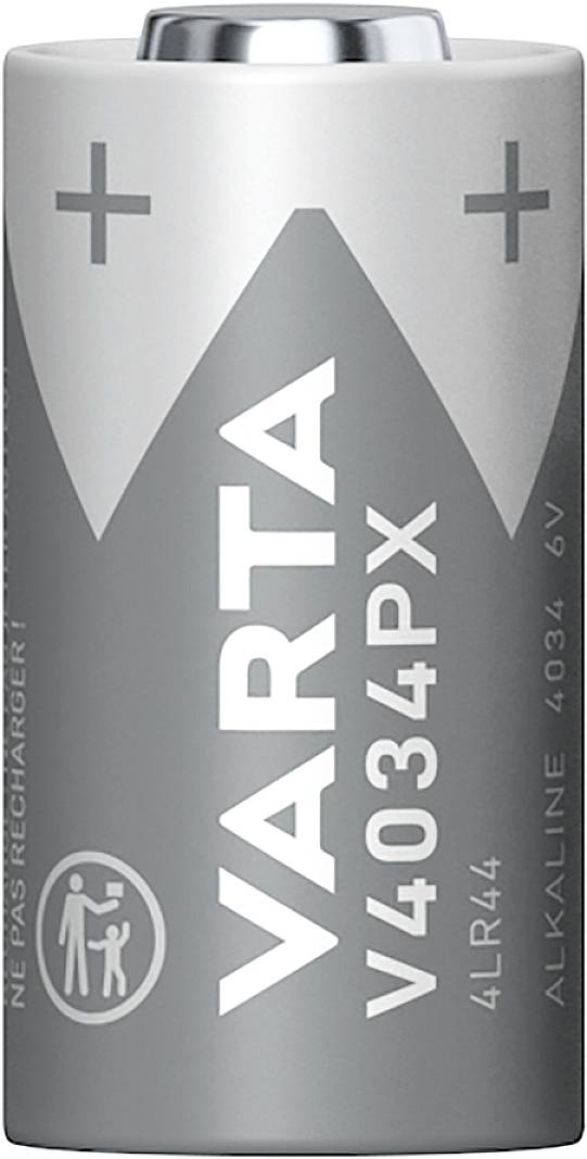 Une batterie argentée de la marque Varta, modèle V4034PX, 6V, avec des symboles plus et moins.