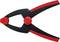 Pince de serrage en plastique noir et rouge avec bouton de rotation rouge au centre, adaptée pour maintenir et fixer des pièces de travail.