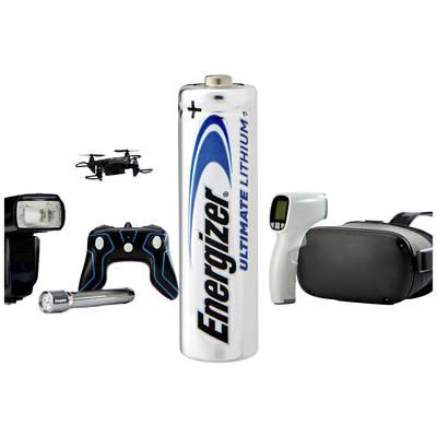 Une grande batterie au lithium au centre, entourée d'appareils électroniques tels qu'un drone, une télécommande et une lampe de poche.