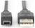 Gros plan sur deux extrémités de câble : une fiche mini-USB à gauche et une fiche USB standard à droite.