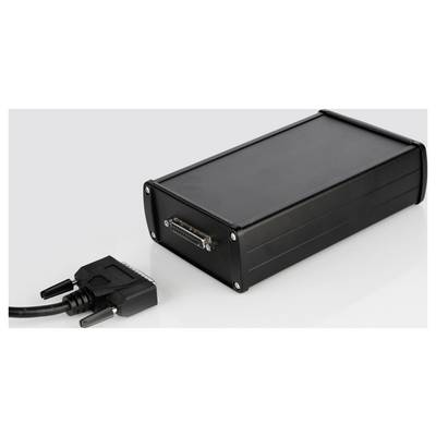 Un appareil noir et rectangulaire avec une connexion de câble repose sur une surface claire. Il présente un connecteur avec plusieurs broches.