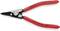 Pince à circlips rouge avec embouts noirs, portant l'inscription : « Knipex 4611A0 3-10mm » et « Chrom-Vanadium Germany ».