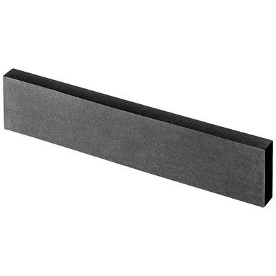 Bloc rectangulaire gris reposant sur une surface claire.