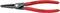 Une pince à circlips rouge de la marque Knipex, adaptée pour des circlips de 40 à 100 mm, fabriquée en Allemagne.