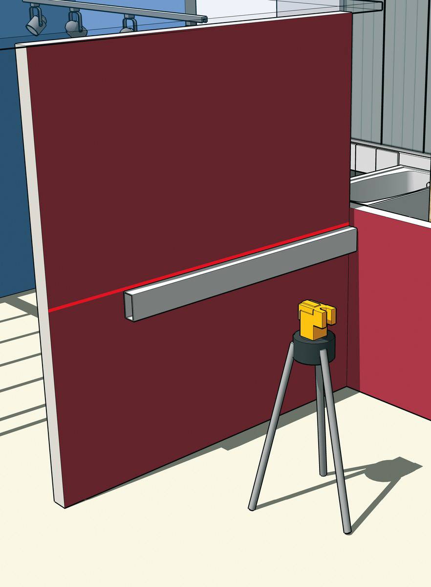 Un nivellement laser monté sur un trépied projette une ligne rouge sur un mur rouge afin de garantir un alignement horizontal.