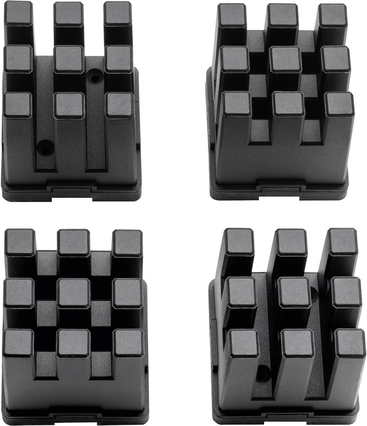 Quatre objets noirs rectangulaires avec des barres verticales de hauteurs différentes sur leur surface supérieure. Ils sont disposés en carré.