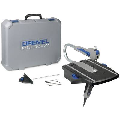 Scie sauteuse 'Dremel Moto-Saw' avec accessoires, posée sur une table. À droite, l'appareil avec sa lame de scie, à gauche un coffret gris.