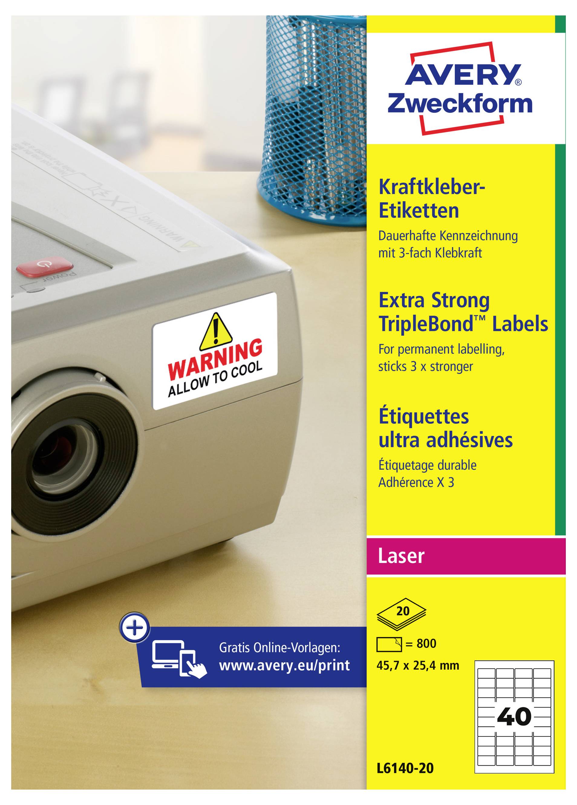 Étiquettes Avery Zweckform Extra Strong TripleBond pour imprimantes laser, montrant une étiquette d'avertissement appliquée à un projecteur et taille d'étiquette 45,7 x 25,4 mm.