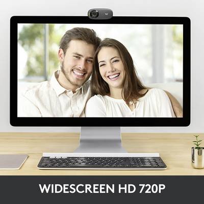 Un écran posé sur un bureau affiche un couple souriant. En dessous est inscrit « Format large HD 720p ».