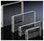 Quatre boîtiers en plastique transparent rectangulaires de différentes tailles, disposés en diagonale les uns derrière les autres sur un fond sombre.