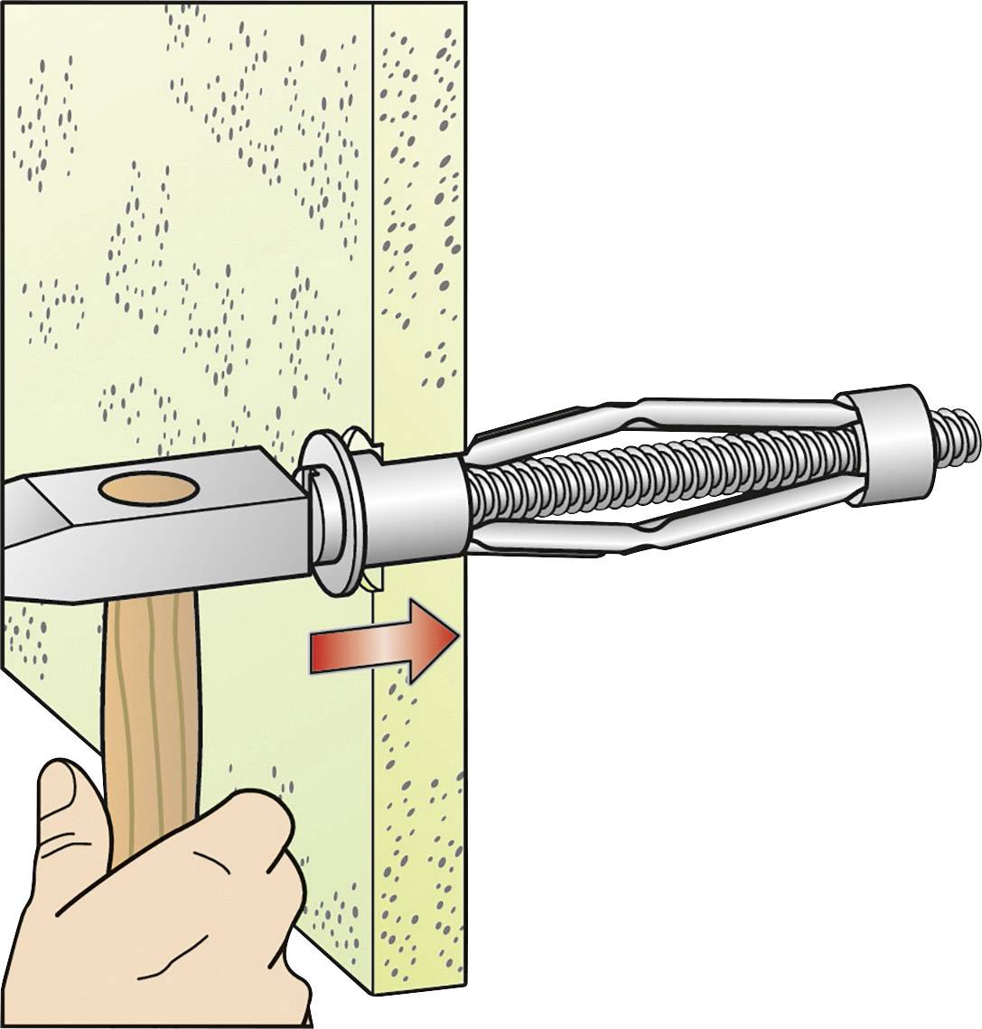 Une main frappe un cheville avec un marteau pour la fixer dans un mur. La cheville est immobilisée et sécurisée par ce mouvement.