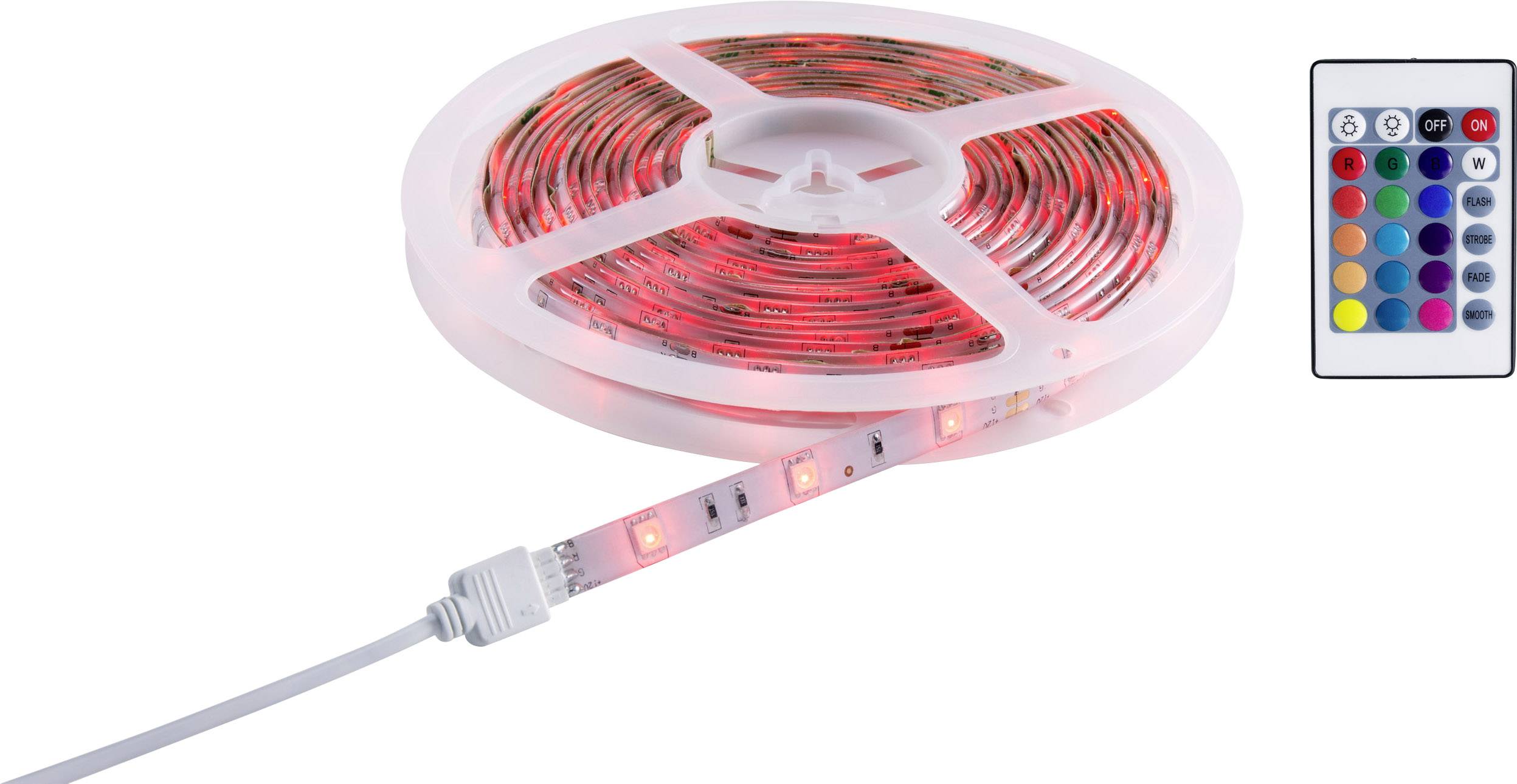 Rouleau d'un ruban LED émettant une lumière rouge, à côté d'une télécommande offrant diverses combinaisons de couleurs.