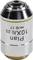 Objectif de microscope portant l'inscription « Plan 10X/0,25 ». Il indique la performance optique et le grossissement.