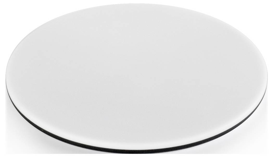 Un disque blanc fin et rond avec un bord noir, posé à plat sur une surface.
