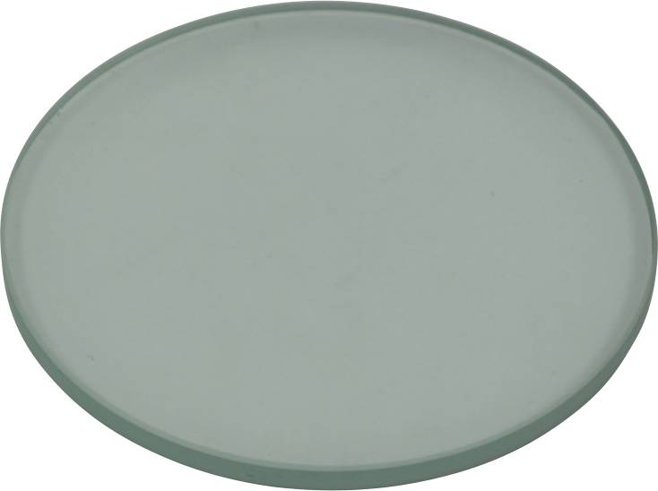 Petit disque de verre rond sur fond blanc.