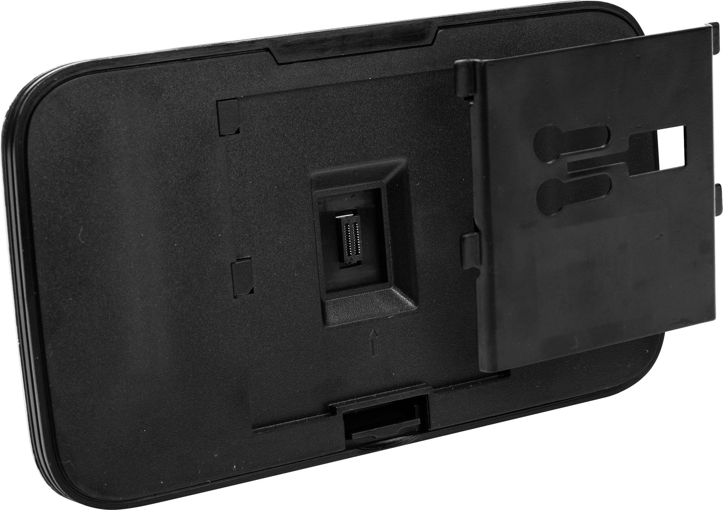 L'image montre le dos d'un appareil électronique noir de forme rectangulaire avec un module de couverture amovible.