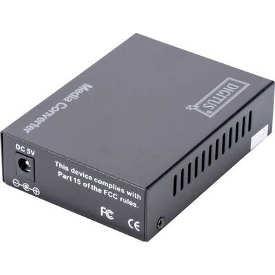 Convertisseur multimédia compact noir portant l'inscription « Cet appareil est conforme à la Partie 15 des règles de la FCC », avec connexion d'alimentation CC et logos.