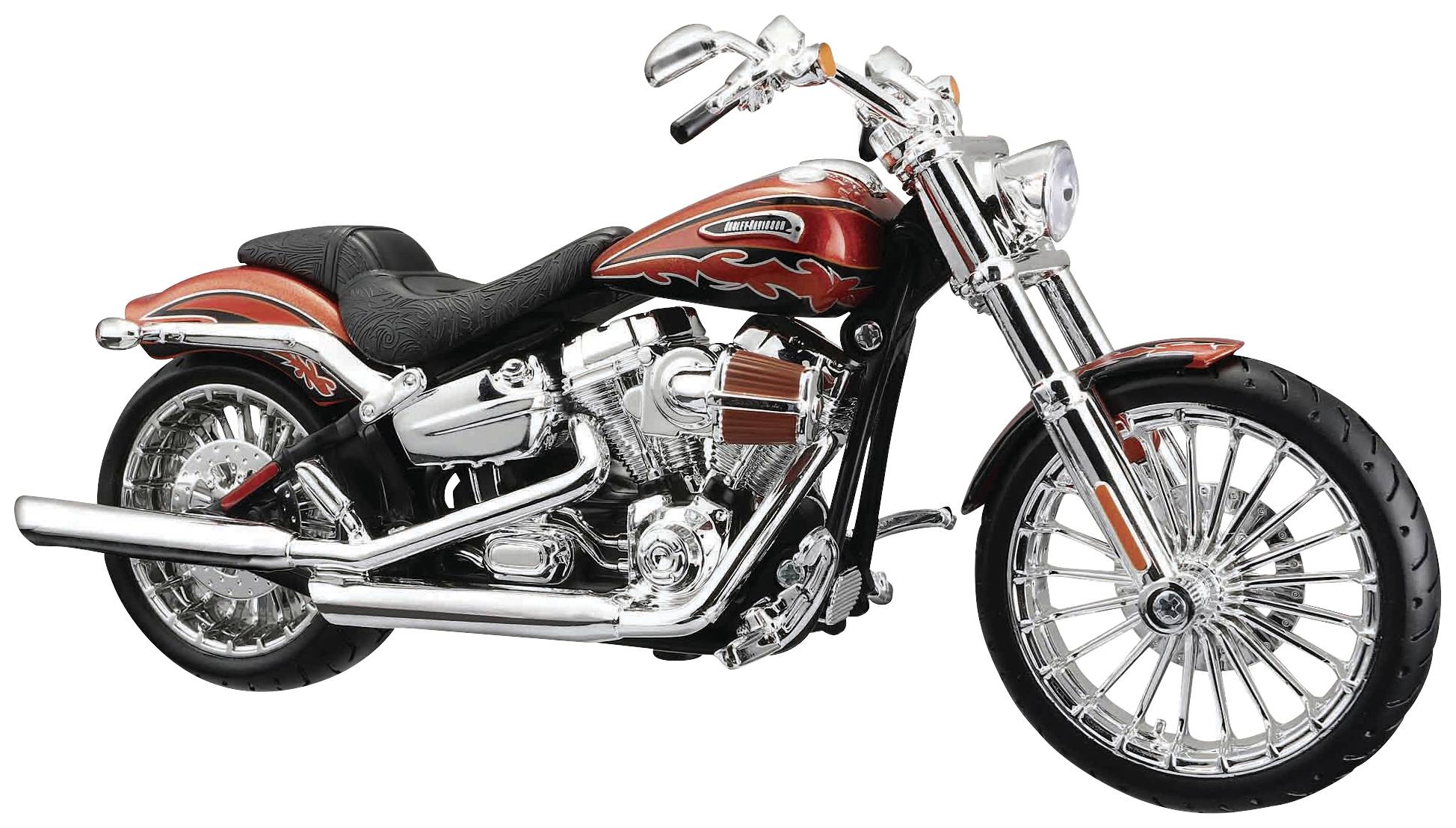 Une moto chromée brillante avec des accents de flammes rouges sur le réservoir est vue de profil.